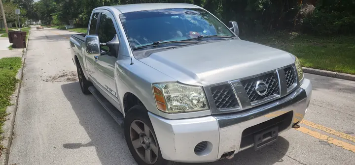 Front passenger-side view of the silver Nissan Titan
